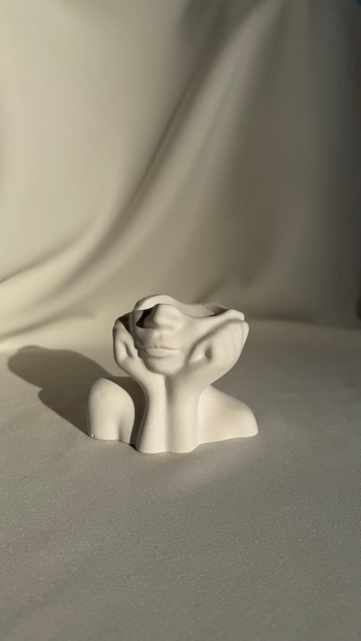 Face-Shaped Sculpture - white concrete